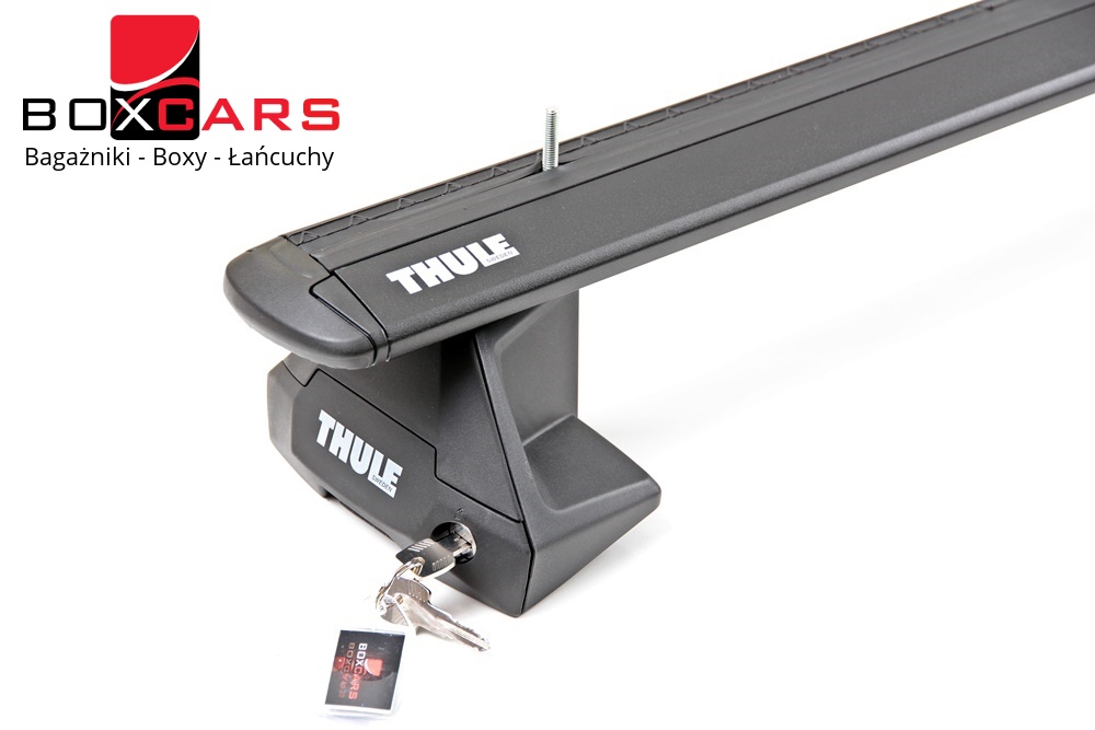 Zbliżenie stopy Thule Evo Clamp z zamkiem i belką WingBar Evo Black